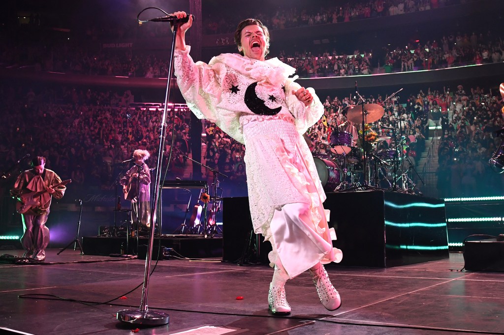 Harry Styles rocks a fabulous frock during his "Harryween" show at Madison Square Garden on Saturday.