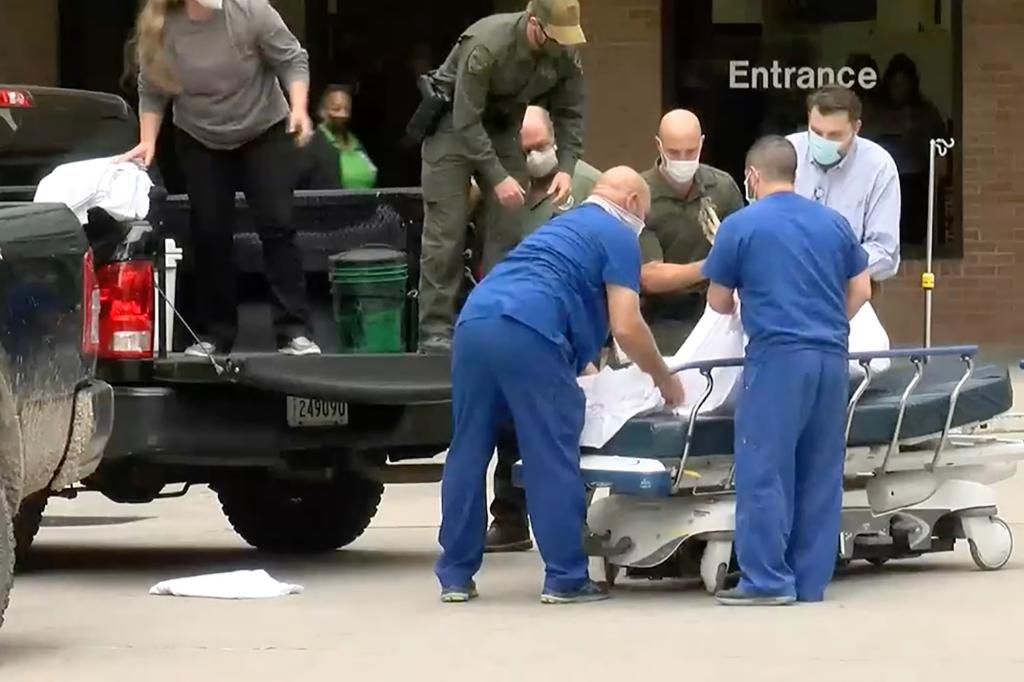 Hospital workers managed to corral the animal and held it down until the wildlife services arrived.