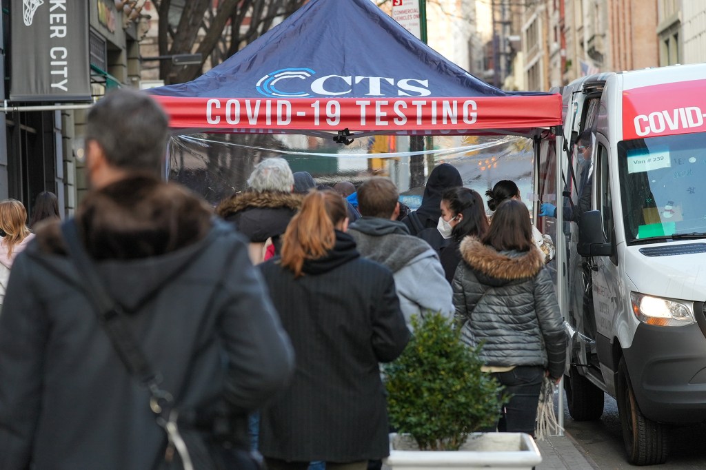 Groups of people line-up to get tested for Covid-19 on December 17, 2021 in New York City. 