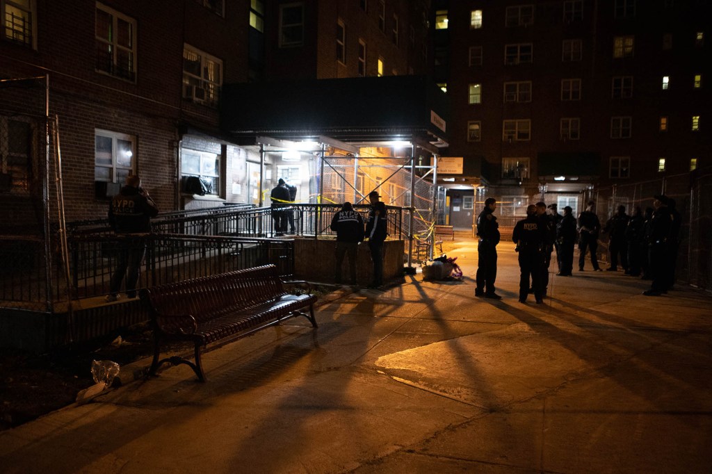 Police are seen at the scene of a shooting in Red Hook on Dec. 9, 2021.