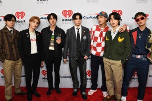 Suga, the songwriter and rapper for the K-pop BTS group, tested positive for the coronavirus after returning from concerts in the United States.