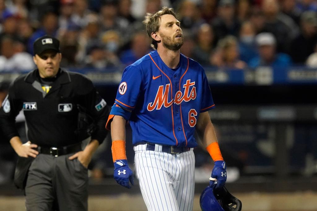 Jeff McNeil (6) of the New York Mets reacts after being hit by a pitch during a game against the Miami Marlins on Sept. 30, 2021.