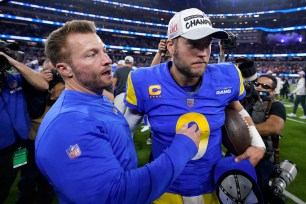 Rams head coach Sean McVay, at left, and Matthew Stafford celebrate.