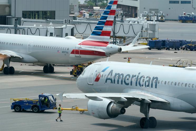 A man was arrested for damaging the cockpit of an American Airlines plane in Miami.