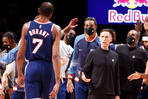 Steve Nash looks at Kevin Durant.