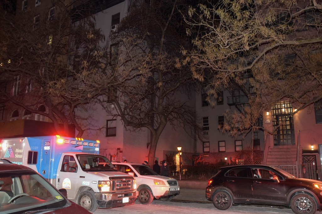 Ambulance in front of building.