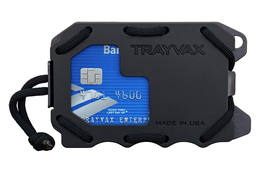 A black metal wallet with a blue credit card 