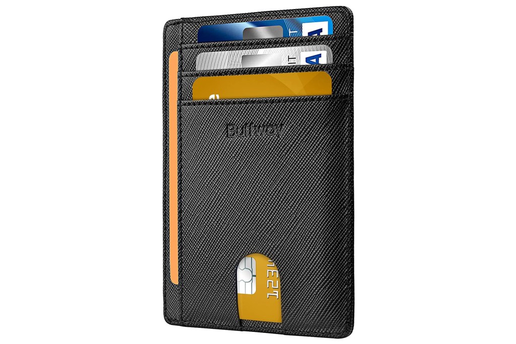 A black wallet with credit cards 