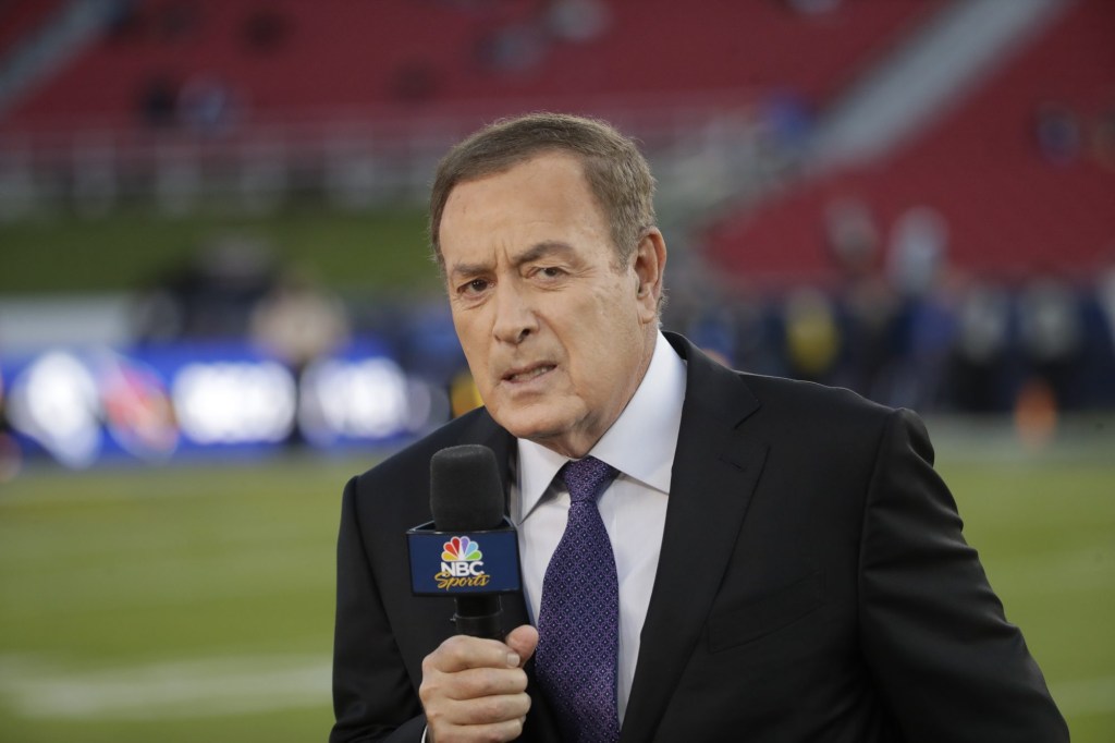 Al Michaels, play-by-play voice for NBC's Sunday Night Football, works on the sideline before a game between the Los Angeles Rams and the Seattle Seahawks, Sunday, Dec. 8, 2019, in Los Angeles.