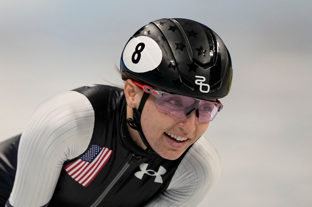 Kristen Santos reacts after her race in a heat of the women's 500-meter during the short-track speedskating competition at the 2022 Winter Olympics, Saturday, Feb. 5, 2022, in Beijing.