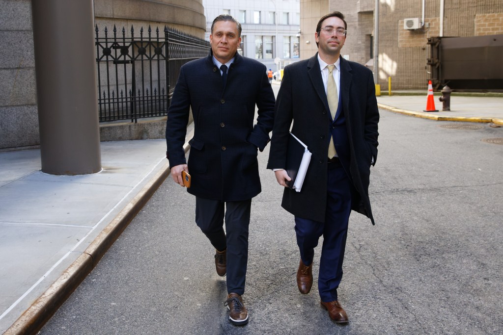 Devon Archer (l.) is seen leaving the Thurgood Marshall Courthouse with his attorney Matthew Schwarts.