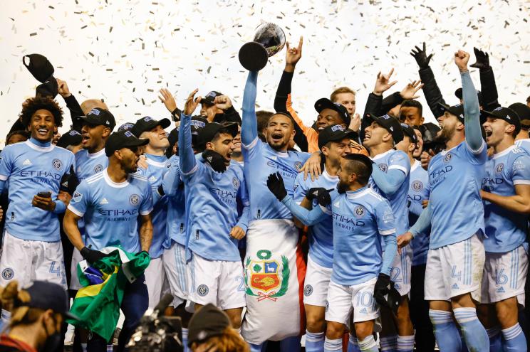 NYCFC lifting the 2021 MLS Cup.