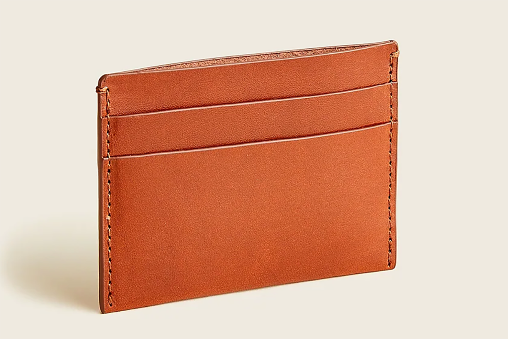 An orange leather cardholder 