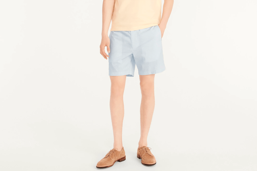 A man in light blue shorts 