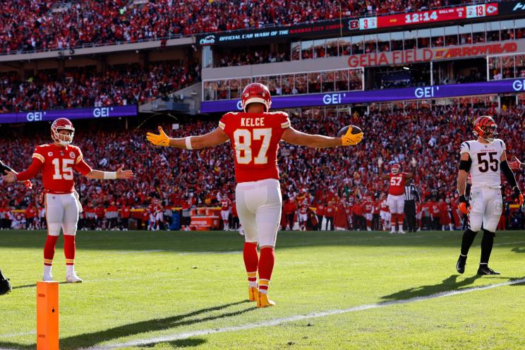 Travis Kelce celebrates with Patrick Mahomes after a touchdown.
