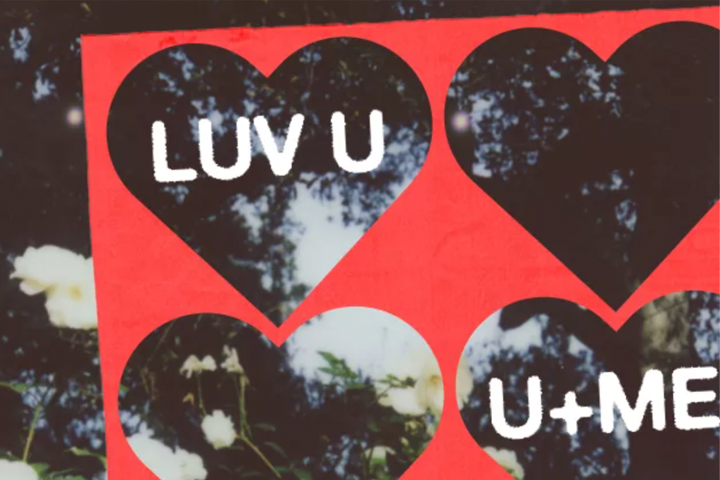 Image of "LUV U" written on front of gift card