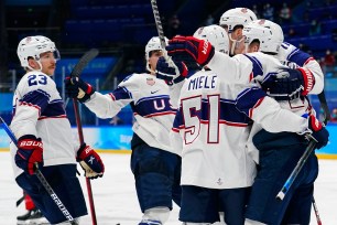 United States players celebrate after Kenny Agostino's goal during their 4-2 win over Canada.