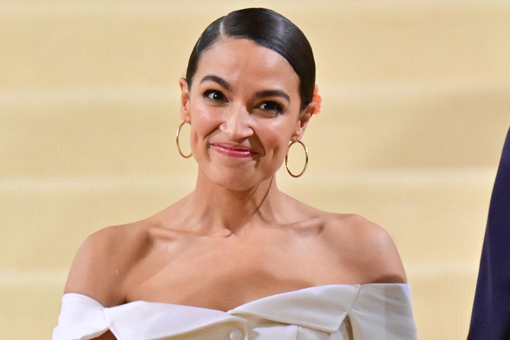 Alexandria Ocasio-Cortez leaves the 2021 Met Gala Celebrating In America: A Lexicon Of Fashion at Metropolitan Museum of Art on September 13, 2021 in New York City.