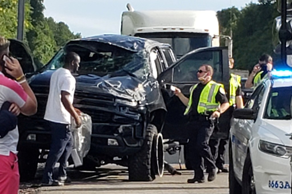 D'Andre Walker and his crashed car.