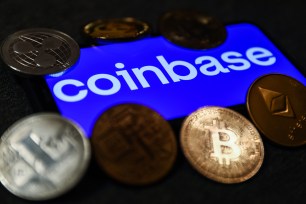 Coinbase logo with a background of crypto coins