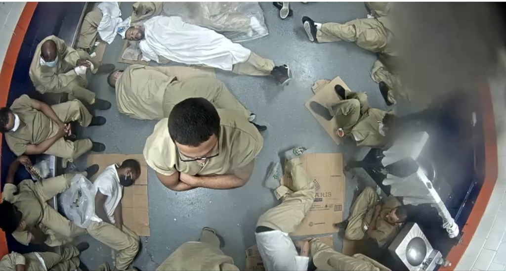 Rikers Island inmates are crammed into a small cell.