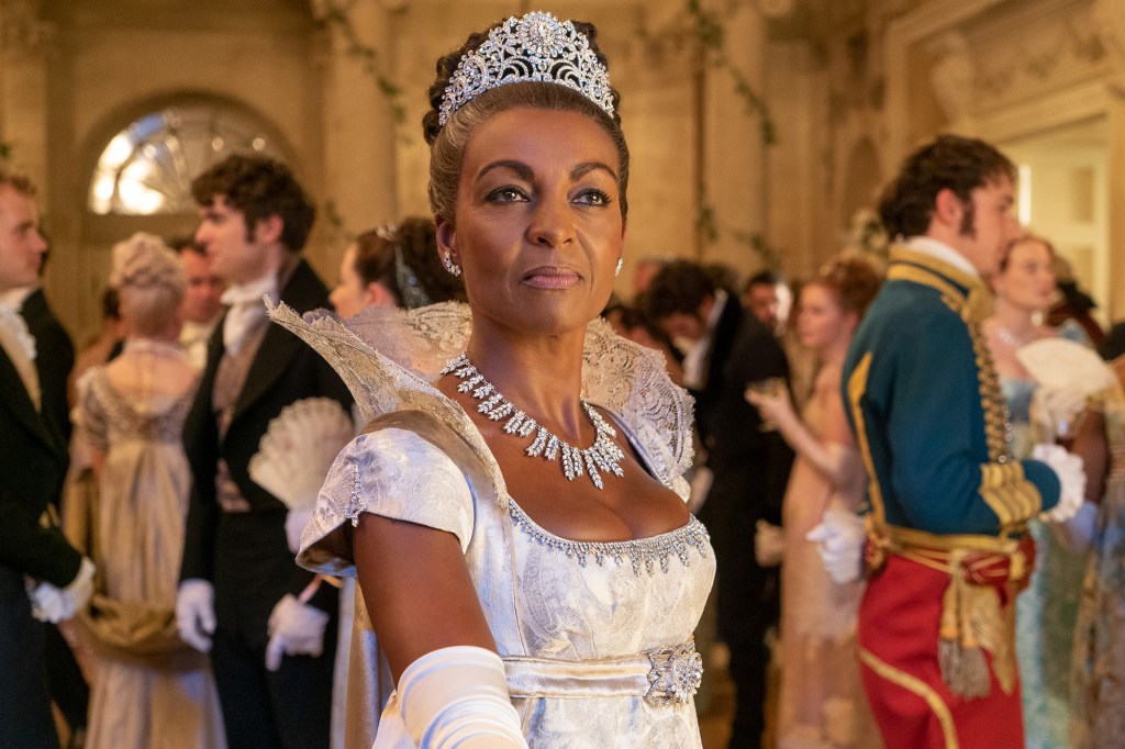 ADJOA ANDOH as LADY DANBURY in a silver gown and crown