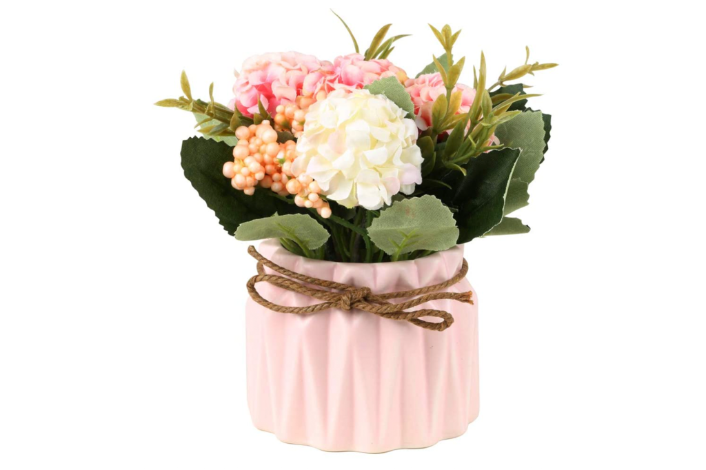 Flowers in a pink small vase