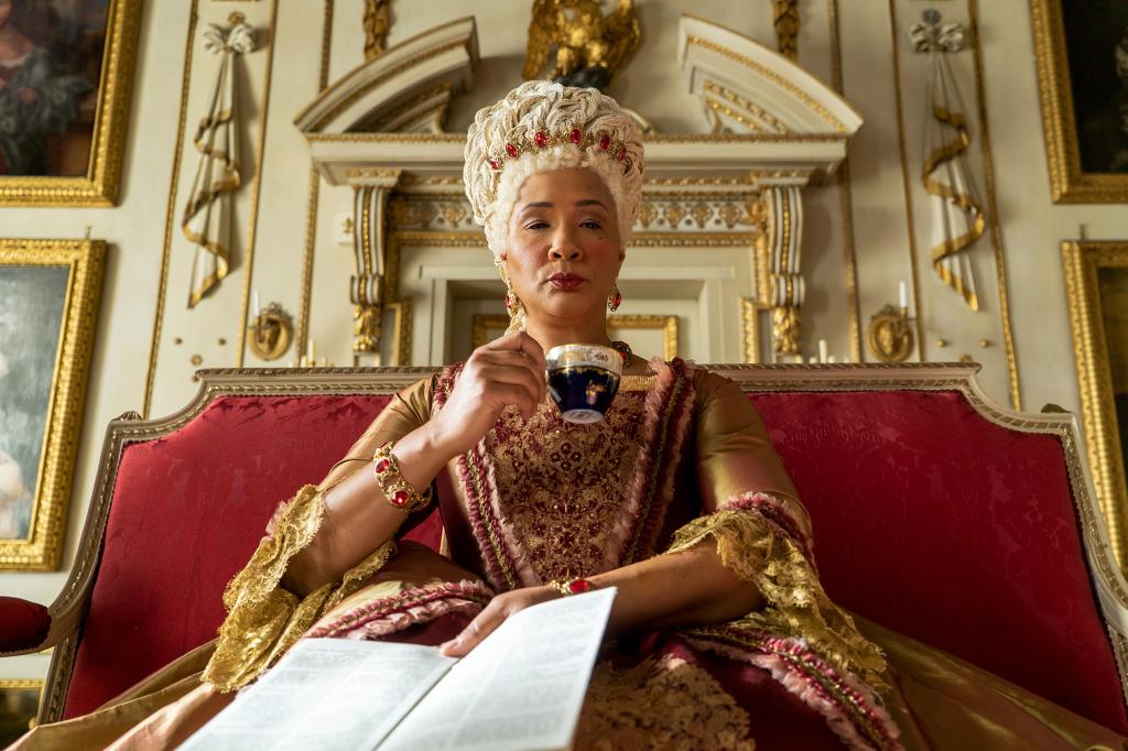 Golda Rosheuvel as Queen Charlotte with a tea cup