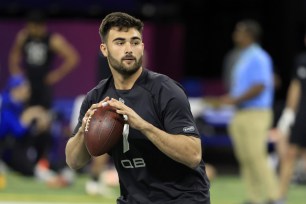Sam Howell of North Carolina throws during the NFL Combine at Lucas Oil Stadium on March 3, 2022 in Indianapolis, Indiana.