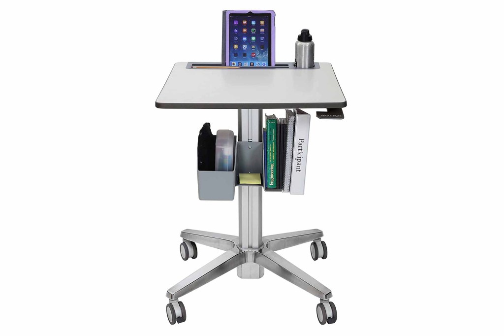 A gray standing desk 