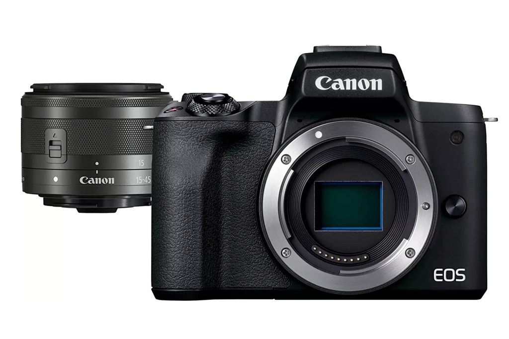 A black Canon camera with an extra lens 