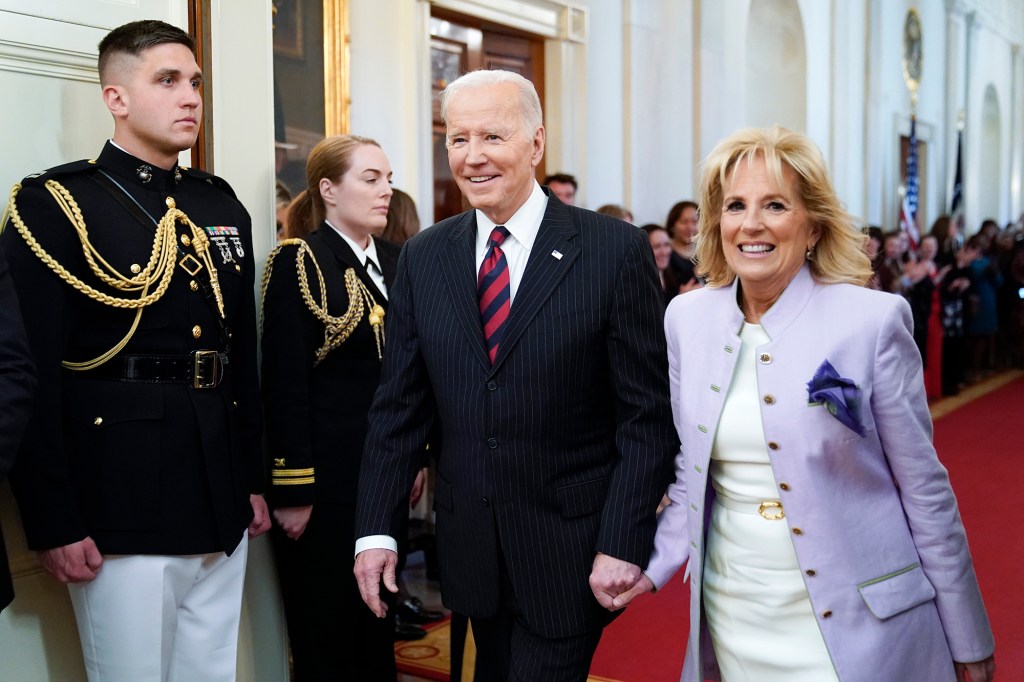 President Joe Biden and first lady Jill Biden arrive for an event to celebrate Equal Pay Day and Women's History Month at the White House, Tuesday, March 15, 2022.