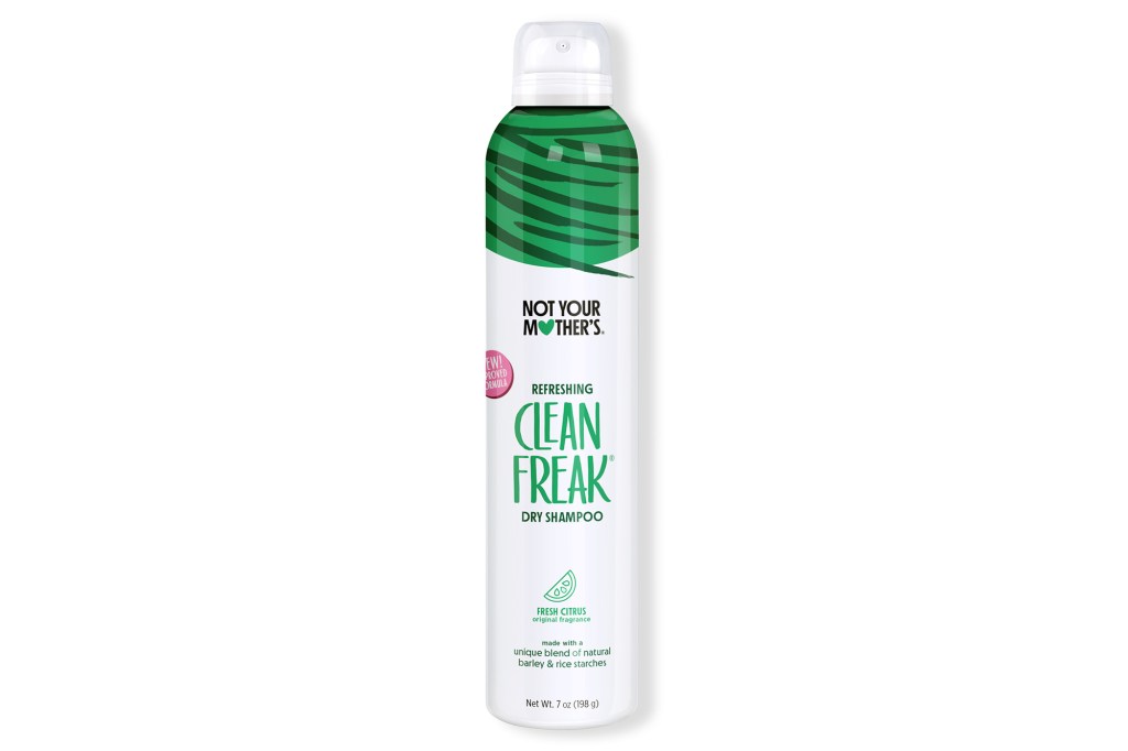 Green and white bottle of dry shampoo