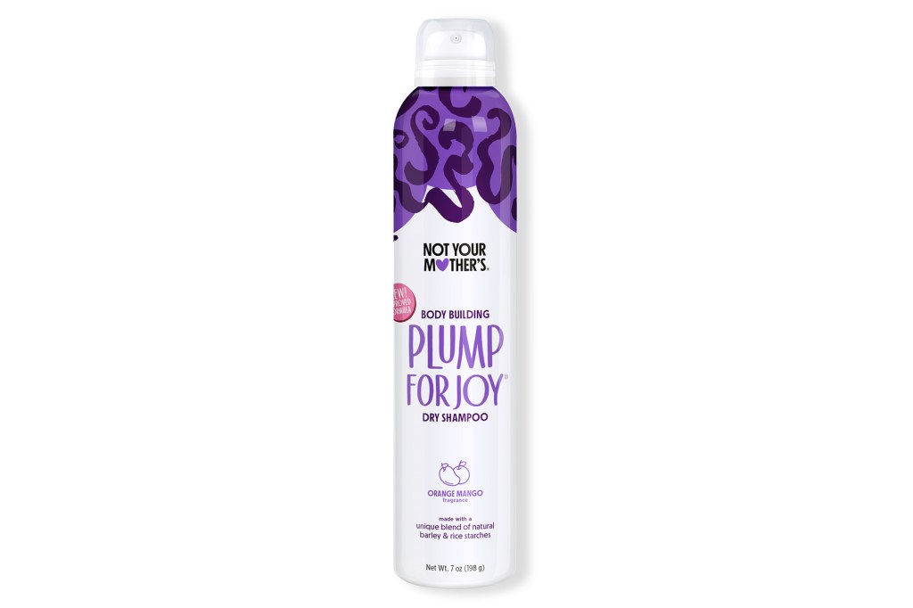 Purple and white bottle of dry shampoo