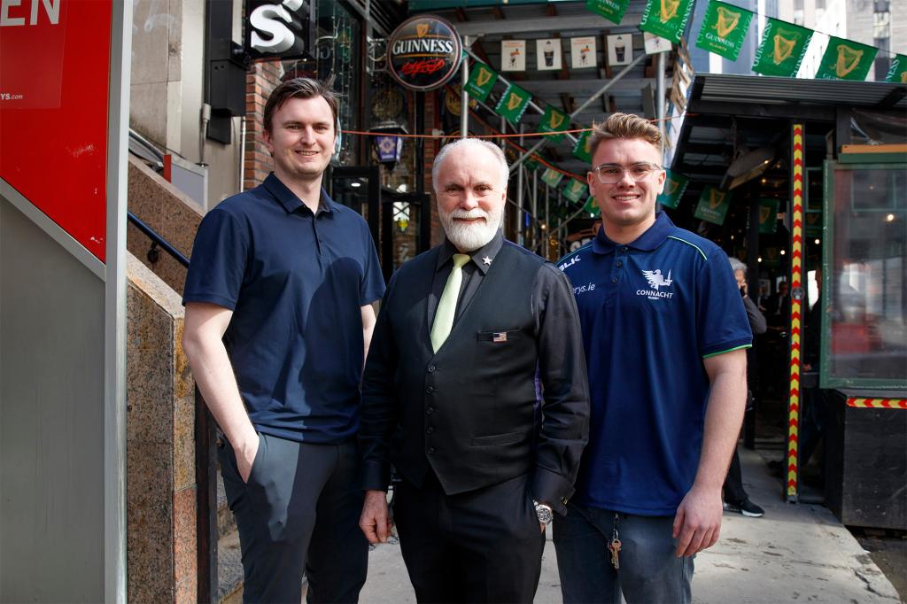 Sean, Bernie and Kevin Reilly stand outside two of their resturants Sean’s Bar + Kitchen and Rilley’s Plates & Pours.