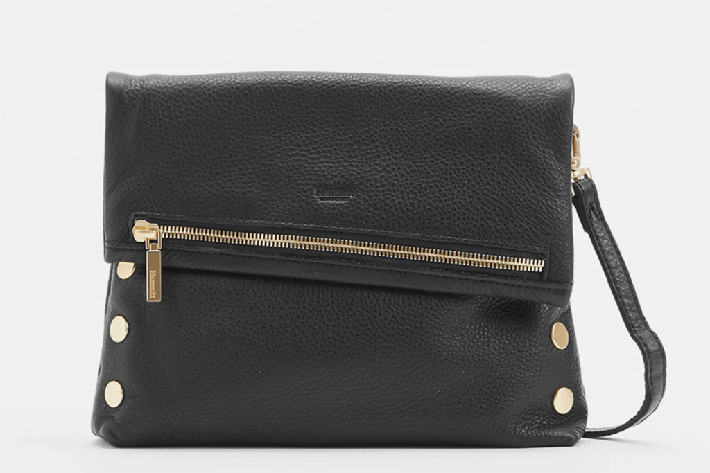 A black crossbody purse with zipper