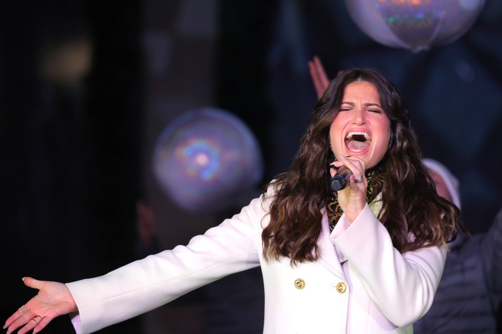 NEW YORK, NEW YORK - NOVEMBER 25: Idina Menzel performs during the Disney and Saks Fifth Avenue unveiling of "Disney Frozen 2" holiday windows on November 25, 2019 in New York City. (Photo by Brett Carlsen/Getty Images for Disney)