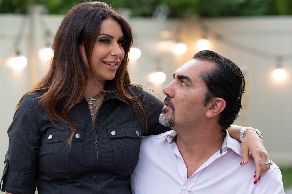 Jennifer Aydin in a black shirt with husband Bill in a still from the RHONJ