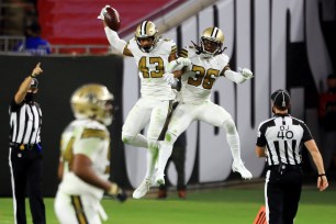 Marcus Williams #43 of the New Orleans Saints celebrates with D.J. Swearinger #36 after intercepting a pass during the second quarter against the Tampa Bay Buccaneers.