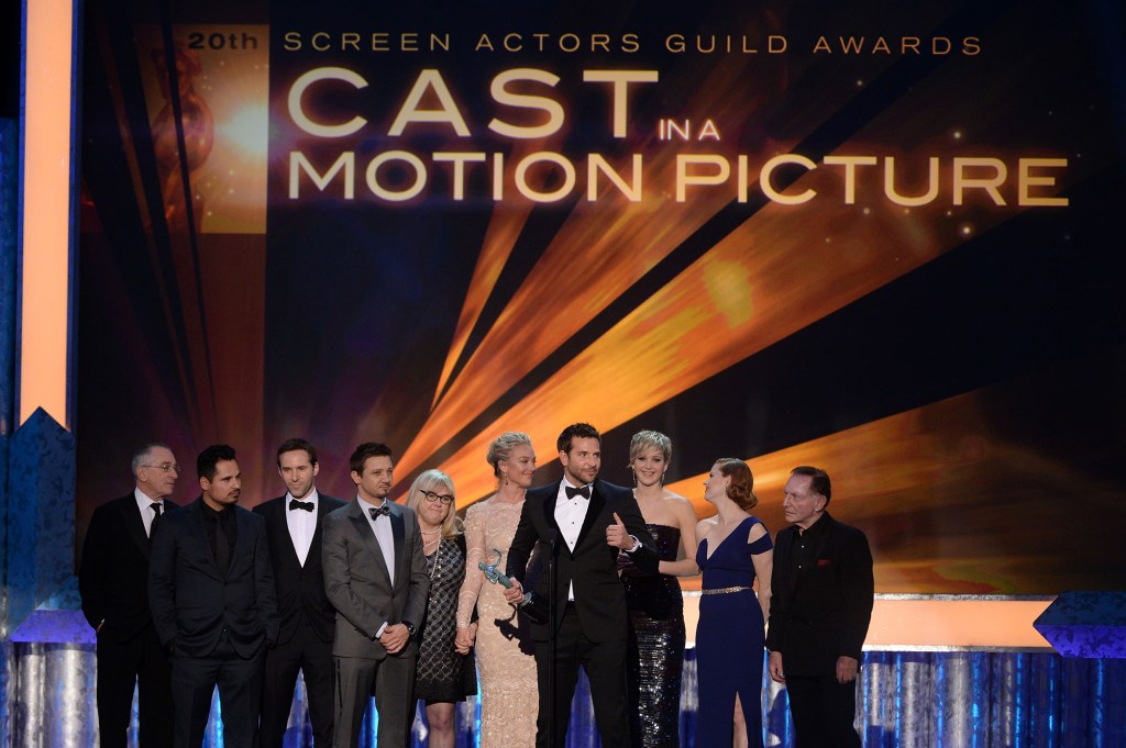 Robert De Niro, Michael Pena, Alessandro Nivola, Jeremy Renner, Colleen Camp, Elisabeth Rohm, Bradley Cooper, Jennifer Lawrence, Amy Adams, and Paul Herman accept the Outstanding Performance by a Cast in a Motion Picture award for '"American Hustle."