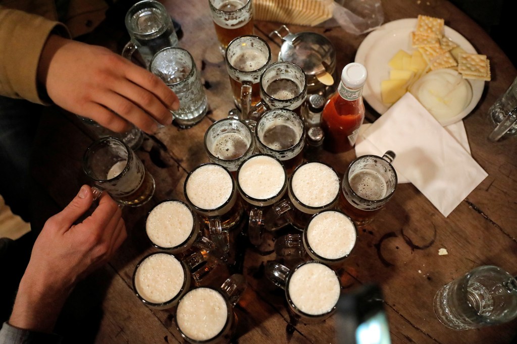 A final round of ales sit on a table at McSorley's Old Ale House, which, established in 1854, is referred to as New York City's oldest Irish saloon and was ordered to close at 8:00pm as part of a city-wide order to close bars and restaurants in an effort to slow the spread of coronavirus the day before Saint Patrick's Day in Manhattan, New York City, New York, U.S., March 16, 2020. 