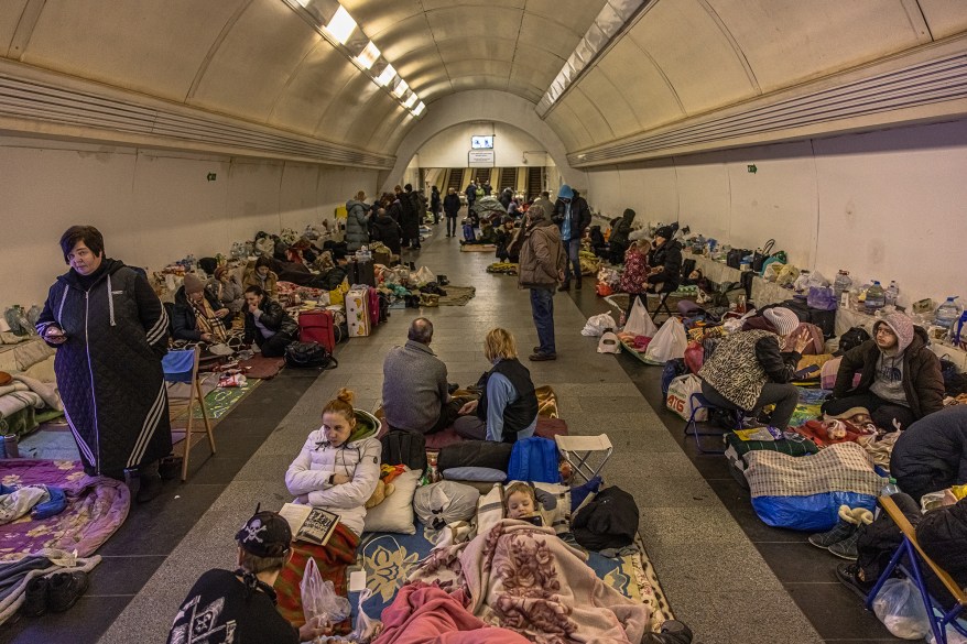 People shelter inside the Dorohozhychi subway station in Kyiv, March 2.