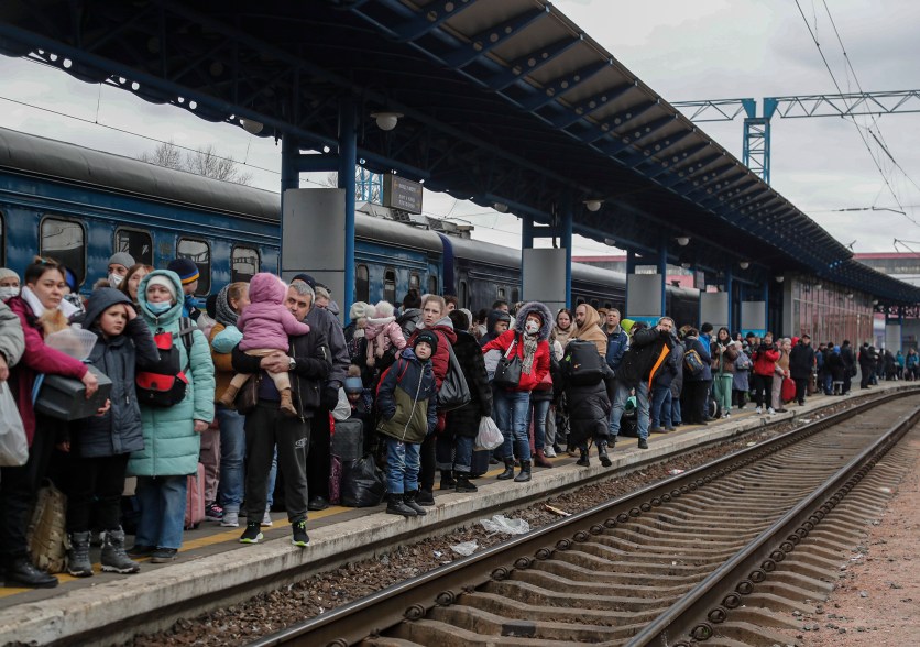 People wait at the platform for an evacuation train at the main railway station in Kyiv, March 5.