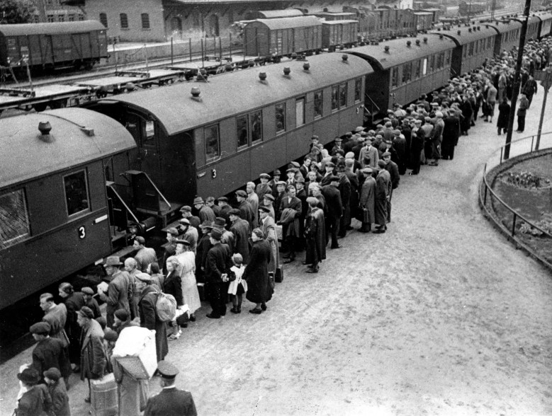 German refugees wait to board a train at Klingenthal station in Czechoslovakia in Sept. 1938. The German-speaking Czechs are fleeing Sudetenland to a refugee camp in Germany.