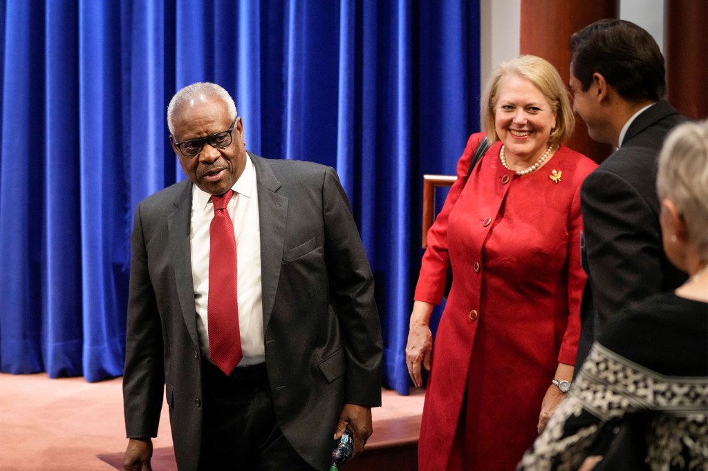 Clarence Thomas, left and his wife Virginia Thomas