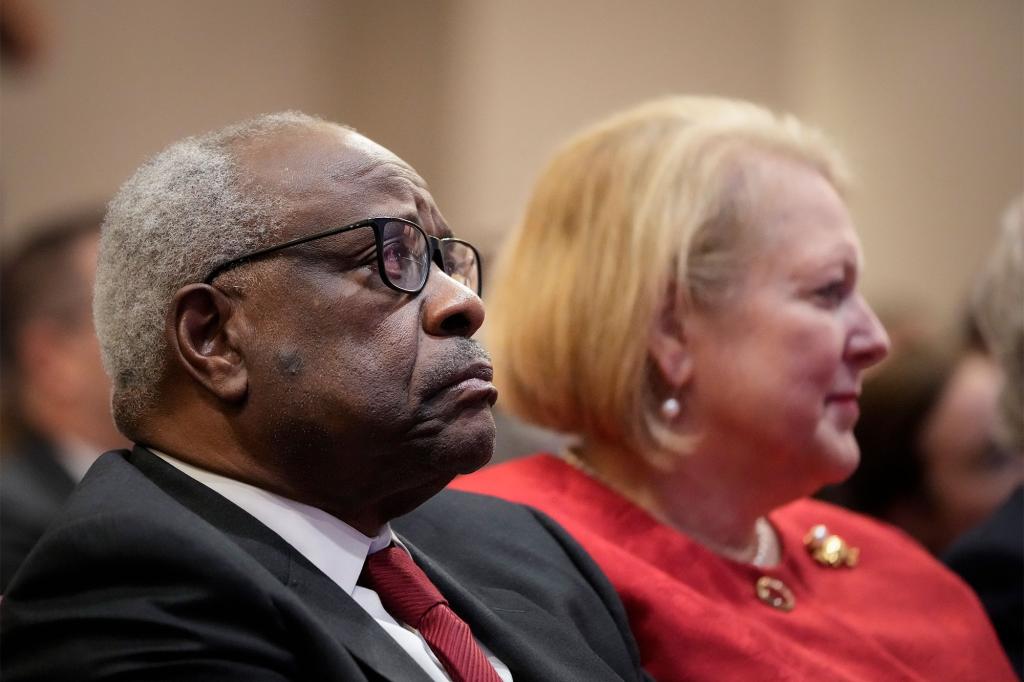 Clarence Thomas, left and his wife Virginia Thomas