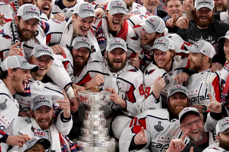 Alex Ovechkin #8 of the Washington Capitals poses with his teammates for the team photo after their 4-3 win over the Vegas Golden Knights to win the Stanley Cup.