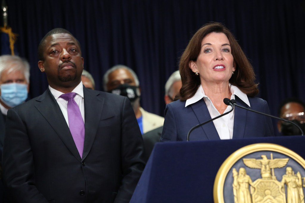 NY State Governor Kathy Hochul signs the “Less is More” bill on September 17, 2021, in her Manhattan, NY office.