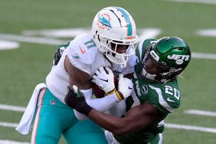 DeVante Parker makes a catch in a game against the Jets last season.