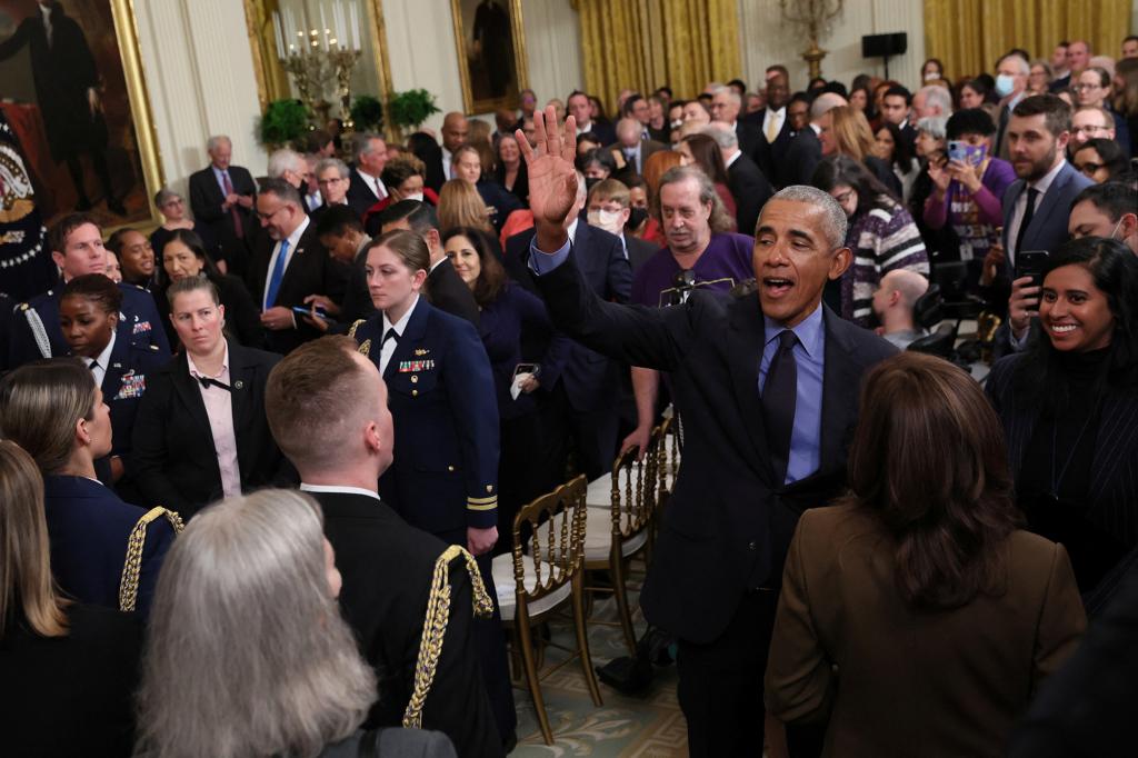 Former U.S. President Barack Obama greets guests after speaking about the Affordable Care Act and Medicaid at an event with U.S. President Joe Biden and Vice President Kamala Harris at the White House in Washington, U.S., April 5, 2022. REUTERS/Leah Millis